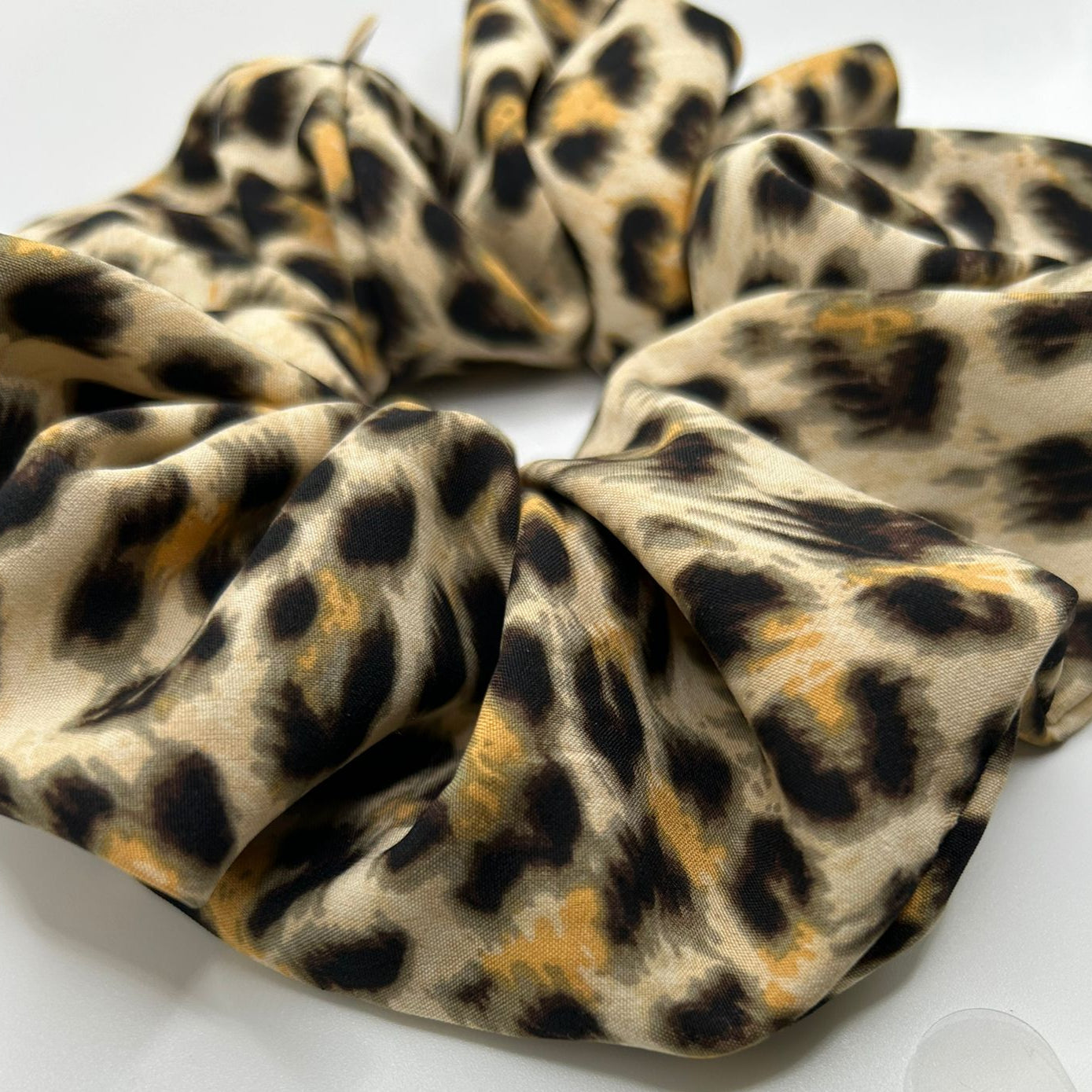 Animal print rayon fabric close up from a scrunchie