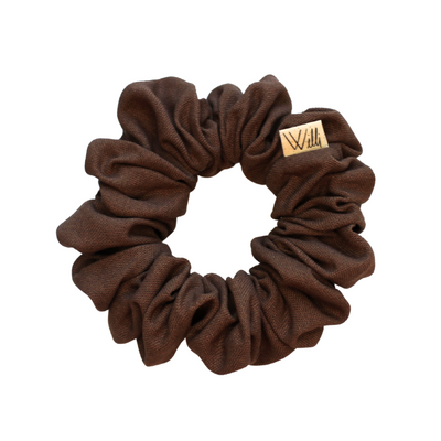 Brown scrunchie with a brand logo on a white background
