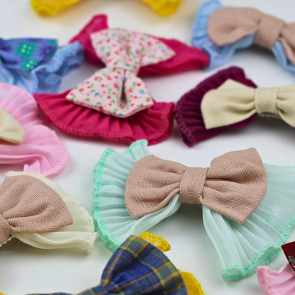 Colorful hair bows on a white background