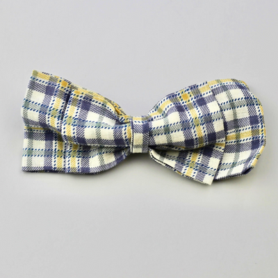 Plaid bow tie on a gray background
