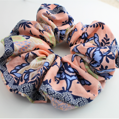Set of floral patterned scrunchies on a white background