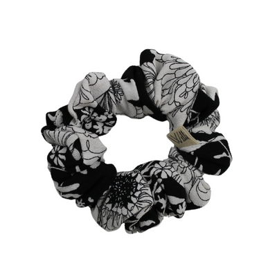 Black and white patterned scrunchie on a white background