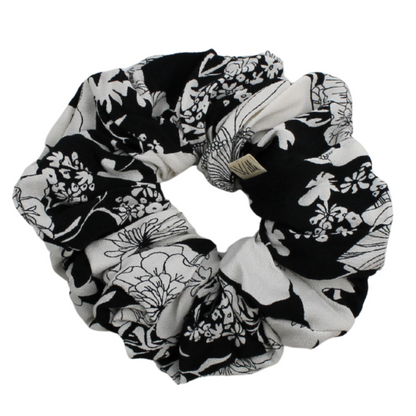 Black and white floral scrunchie on a white background