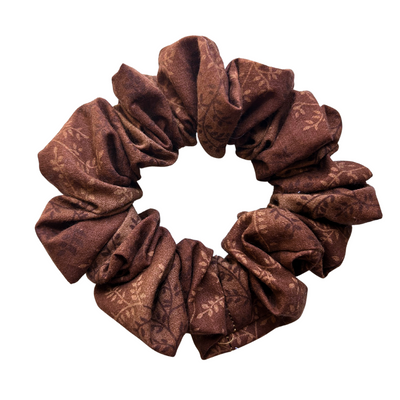 Brown scrunchie on a white background