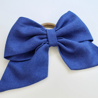 Blue hair bow ribbon on with background