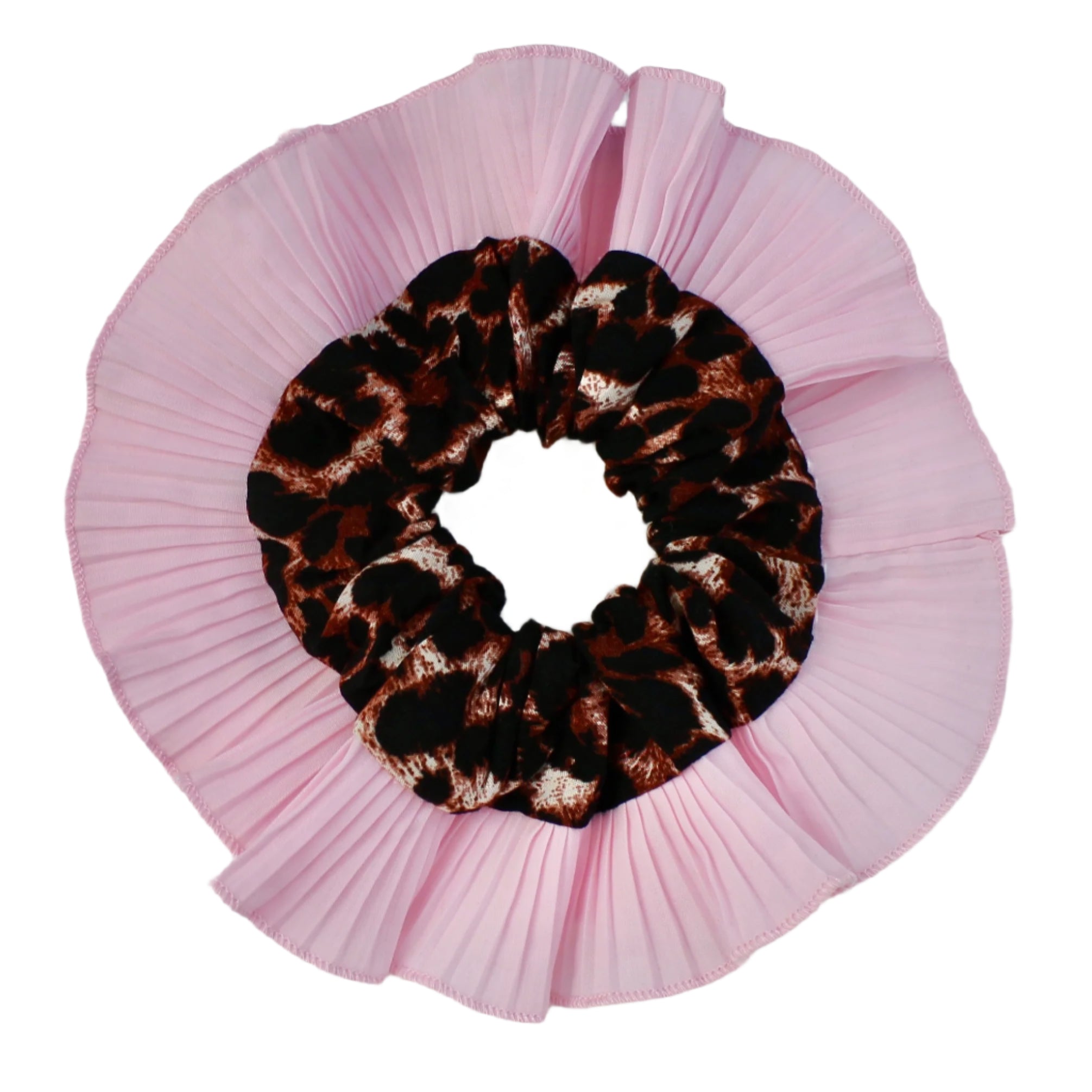 Pink scrunchie with a leopard print center on a light gray background