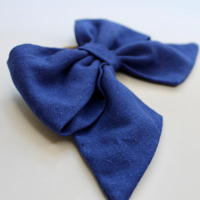 blue hair bow ribbon rom the size white background
